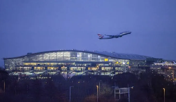 Heathrow terminal with a British Airways jet departing